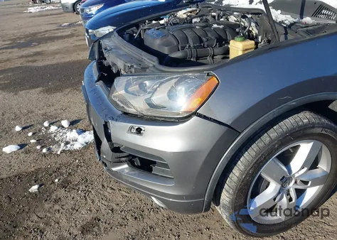 2012 Volkswagen Touareg Vr6 Lux z USA, uszkodzony, nr VIN WVGFF9BP0CD002184